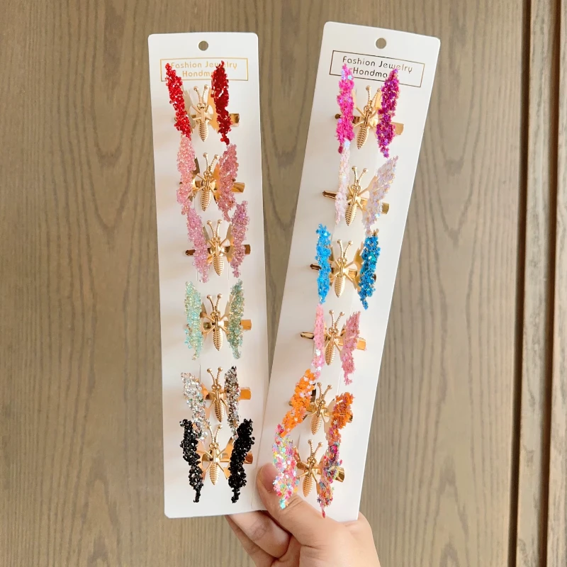 Imagen de DOCENA BROCHE CABELLO MARIPOSA METALICA