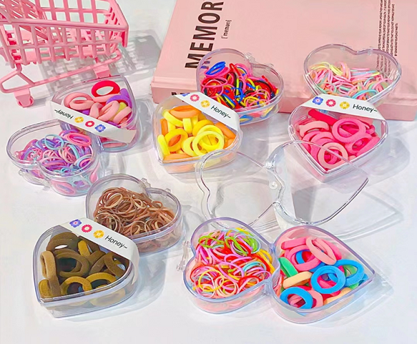 Imagen de DOCE ESTUCHE CORAZON DOBLE LIGA CABELLO
