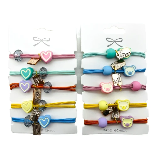 Imagen de DOCE TIRAS C/5 PULSERAS OSITO CORAZON