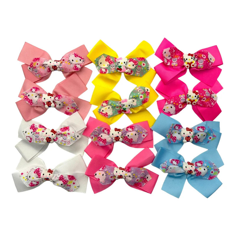 Imagen de DOCENA DE MOÑO HELLO KITTY ESCOLAR