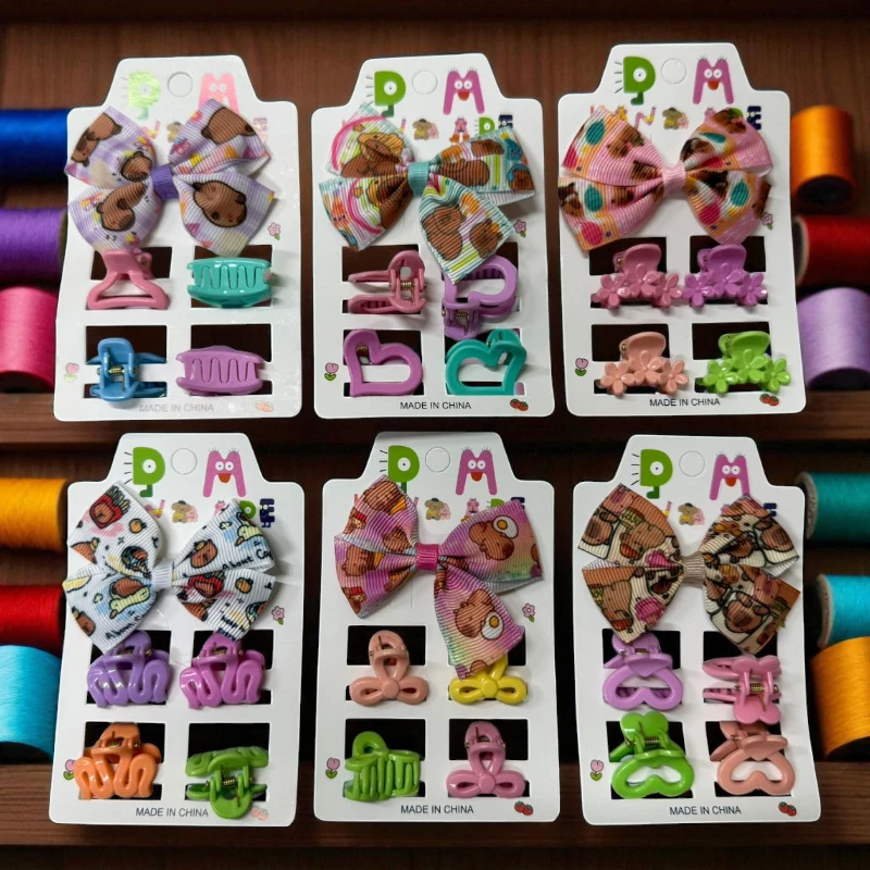 Imagen de DOCENA SET MOÑO + BROCHES CAPIBARA