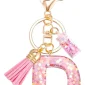 D_NQ_NP_2X_622716-MLM106000914465_012026-F-llavero-letra-resina-dije-inicial-mariposa-colgante-regalo